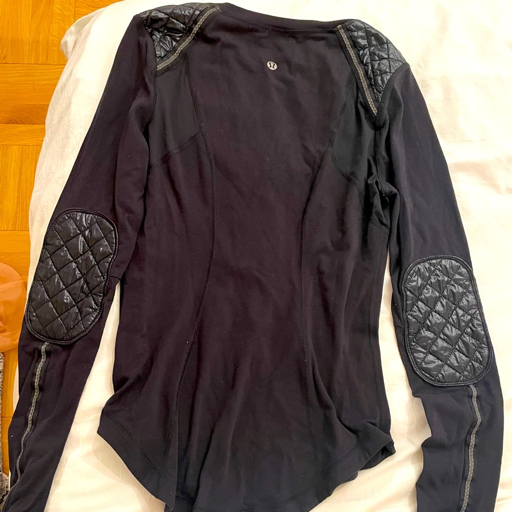 Black long sleeve top w puff shoulders and Elbows